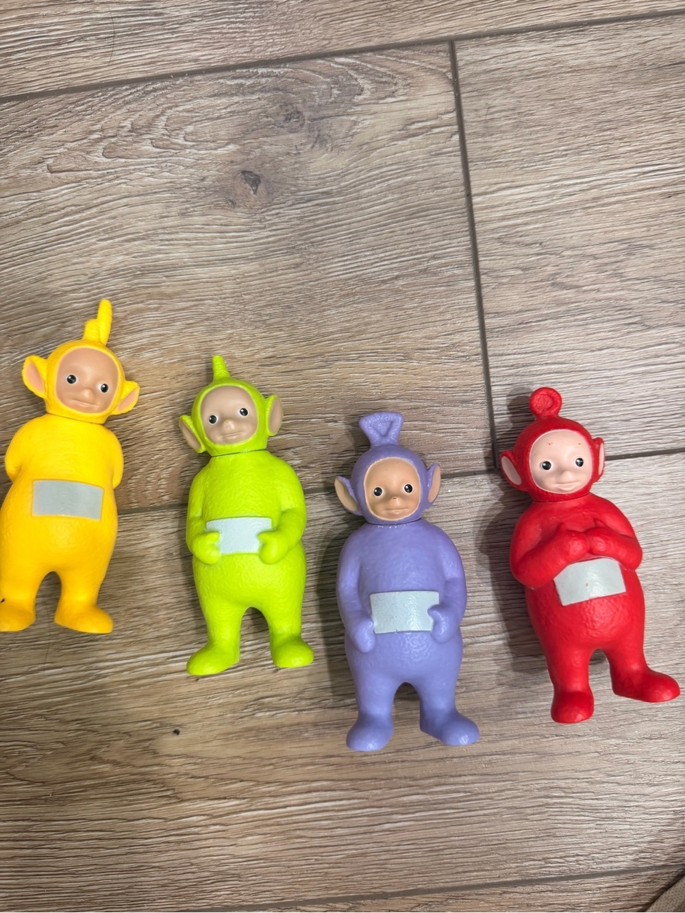 Set of Four Colorful Soft Vinyl Character Figures - Yellow, Green, Purple, Red